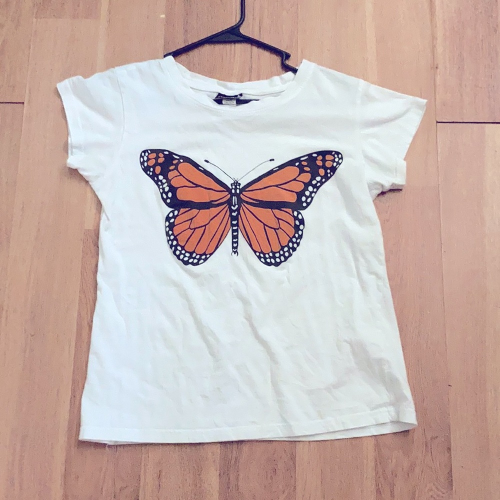 This T-shirt is a butterfly popular sport orange and white medium to large